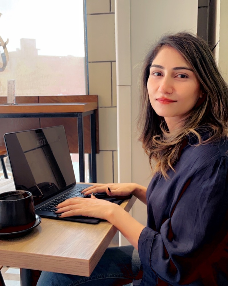 Mona Raza speaking at a corporate communications session